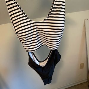 NWT black and white striped one piece bathing suit with cut out